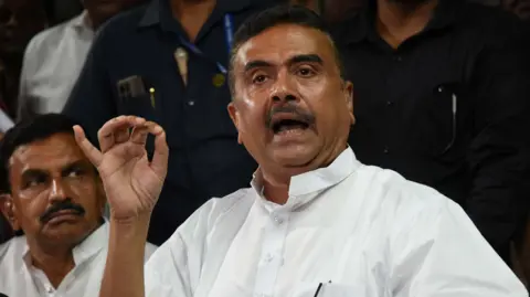 Suvendu Adhikari, a leader of the Bharatiya Janata Party and winning candidate from Bhawanipur and Nandigram assembly constituencies, speaks to the media after meeting West Bengal Chief Electoral Officer Manoj Kumar Agarwal at the CEO office in Kolkata, India, on May 6, 2026. 