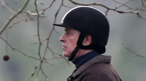 Andrew wearing a riding helmet as he rides in Windsor in February 2026
