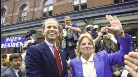 Getty Images Joe Biden standing with his wife Jill in 1987