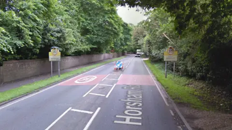 A Google Street image of the A281 leading into Bramley with 30mph signs and "welcome to Bramley" signs on either side of the road.