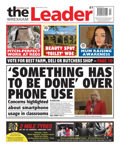 The Wrexham Leader The Wrexham Leader front page. Three stories at the top are in different coloured boxes. In the red box: pitch-perfect work at red with a picture of a stadium. Next yellow box says Beauty spot 'toilet' woe with a photo of an aqueduct. Blue box says: Mum raising awareness with a photo f a woman with long brown hair.. There is a black box beneath the boxes that says Vote for best farm, deli or butchers shop. Below is a black lined box that says: 'Something has to be done' over phone use - Concerns highlighted about smartphone usage in classrooms. 