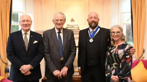 Government House Lieutenant Governor, Stan Clucas, Paul Costain and partner