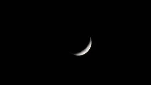 Crescent moon in a very dark sky