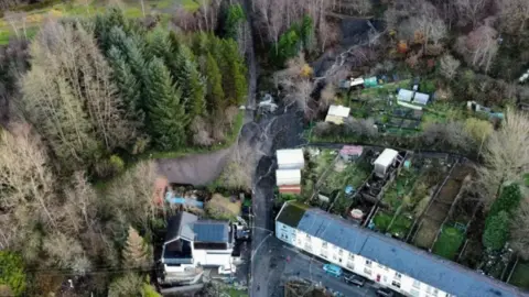 Reuters An aerial image showing the damage from a coal tip slide