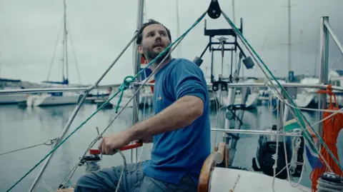 Greg Were Greg Were in a yacht