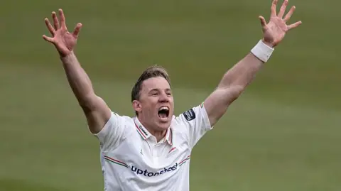 Logan van Beek celebrates after claiming a wicket