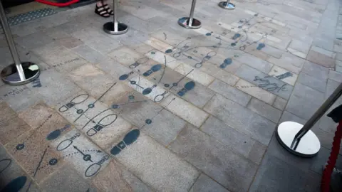 Dartford Borough Council An emgraving on the floor showing a series of dance steps 