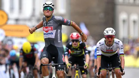 Mathieu van der Poel celebrates winning stage two
