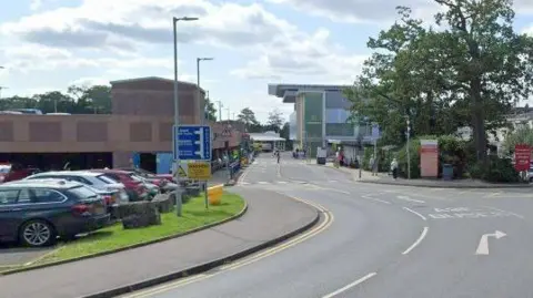 The outside of Frimley park hospital seen from the street