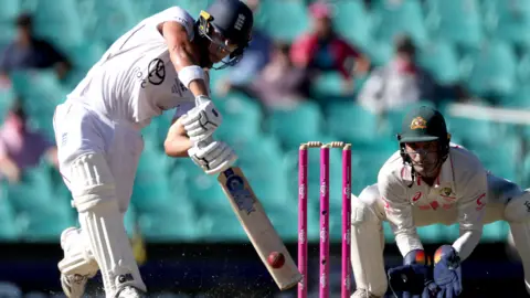 England's Jacob Bethell hits a shot on day four of the fifth Ashes cricket Test match between Australia and England at the SCG in Sydney on January 7, 2026. 