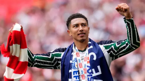 Jobe Bellingham celebrates winning the Championship play-off final with Sunderland in 2025