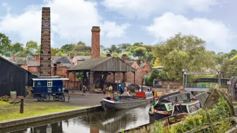 The image shows a historic canal-side industrial scene, likely part of an open‑air heritage site. The setting appears to recreate or preserve a 19th‑ or early 20th‑century working environment, with brick buildings and traditional transport.
