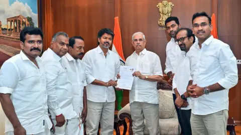 Vijay with Tamil Nadu governor and other TVK party leaders
