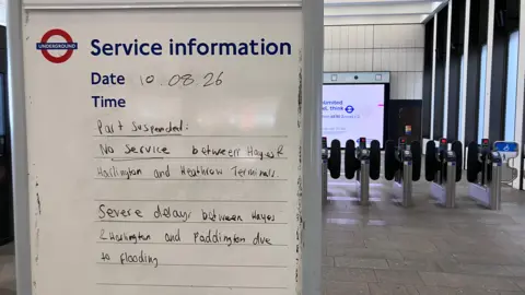 Part suspended service information board at station 