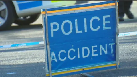 Blue sign reading 'Police Accident'