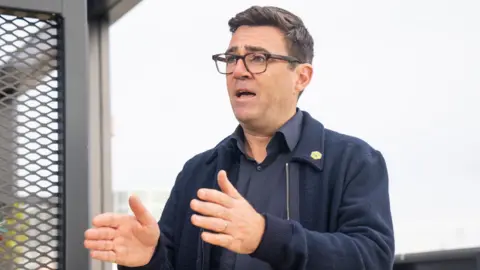 PA Media Andy Burnham