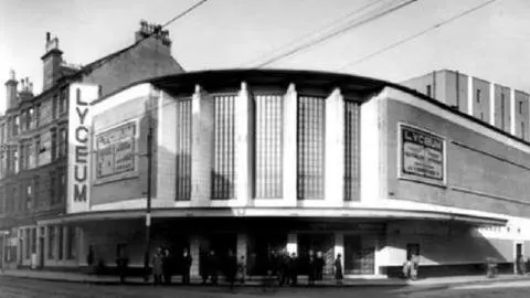 Glasgow City Council A black and white picture of a cinema on a street corner