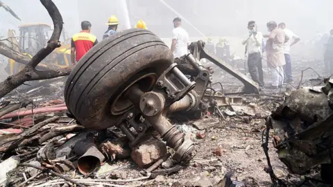 Bloomberg via Getty Images Aircraft landing gear at the crash site of Air India Ltd. flight AI171 in Ahmedabad, Gujarat, India, on Thursday, June 12, 2025. An Air India Boeing 787 Dreamliner traveling from Ahmedabad to London's Gatwick airport crashed shortly after taking off, in what stands to be the most serious accident involving the US planemaker's most advanced widebody airliner. Photographer: Siddharaj Solanki/Bloomberg via Getty Images