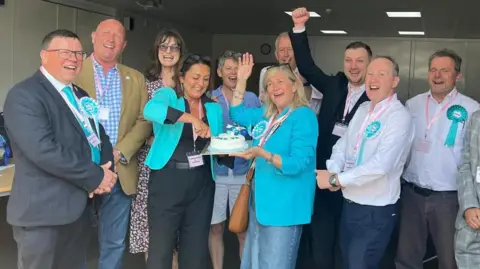 Reform UK councillors and supporters celebrate election victory in Maidstone.