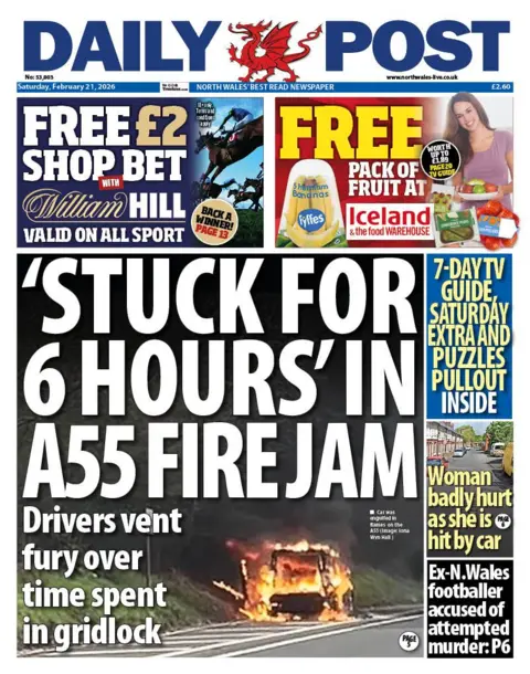 Daily Post Front page of the Daily Post newspaper with the main headline “Stuck for 6 hours in A55 fire jam” above a photo of a car engulfed in flames on a road.