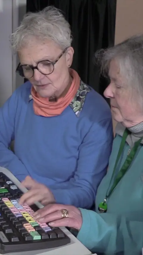 Pam Stubbs standing next to actress Jo Howarth who plays Pam in 'Glitch'