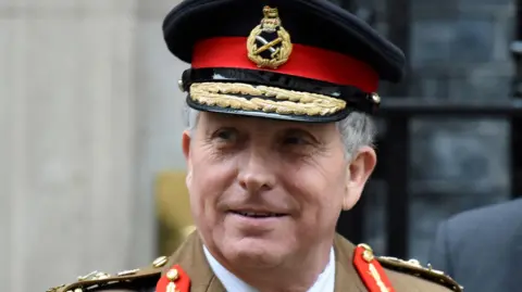 Getty Images A file photo of former chief of the defence staff, Sir Nick Carter, wearing a military uniform outside Downing Street