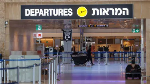 An empty passenger hall Ben Gurion International Airport.