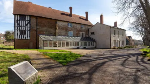 A medieval style building, restored by new brickwork