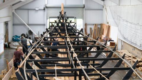 The replica ship being build at The Longshed in Suffolk