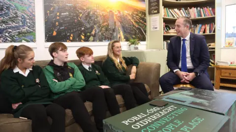 Pacemaker Paul Givan meets Irish speaking young people in west Belfast 