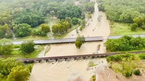 Ergon Energy An aerial view showing damage to the Bruce Highway 