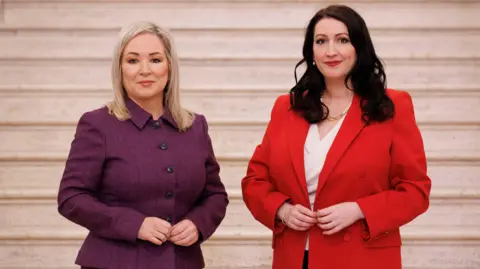 Liam McBurney/PA First Minister Michelle O'Neill and Deputy First Minister Emma Little-Pengelly in the Great Hall at Parliament Buildings in the Stormont estate, Belfast