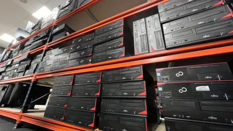 Stuart Woodward/BBC Computers on a shelving unit