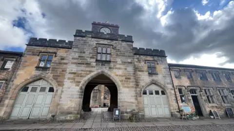 BBC Part of the courtyard at Elvaston Castle, showing two-story mock medieval buildings