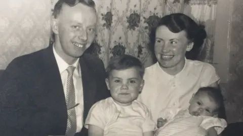 William Cruickshank William Cruickshank pictured as a child with his father, mother and sister, Elaine.