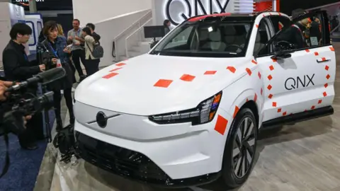 The Volvo EX90, featuring the new QNX software, is showcased inside the Convention Center during CES 2025 in Las Vegas, Nevada, USA, on 9 January, 2025.