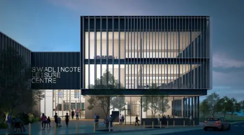 South Derbyshire District Council An artist impression of the proposed leisure centre and council office from the front with large open windows and a large sign that reads 'Swadlincote Leisure Centre'. 
