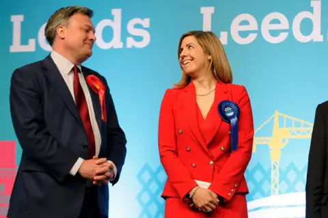 Reuters Conservative candidate Andrea Jenkyns celebrates after being elected as a member of parliament for Morley and Outwood, while Britain"s opposition Labour Party shadow Chancellor Ed Balls looks on at the counting centree in Leeds, in Britain May 8, 2015.