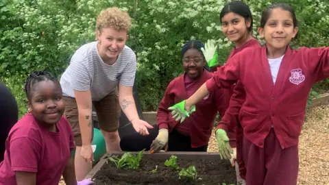 Food etc Children from Cauldwell School, Bedford, growing vegetables