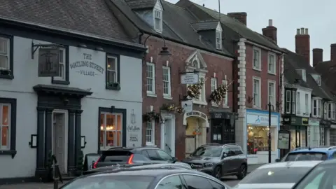 A row of buildings in a town centre