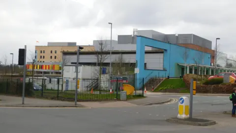 The exterior of the Royal Stoke University Hospital viewed from the road.