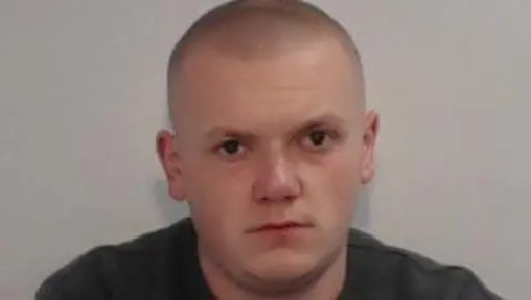 Police custody shot of Nicholas Knowles