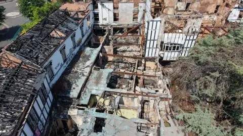 Wychavon District Council An aerial view of the old Raven Hotel in Droitwich - showing the roof blown off the building and piles of rubble on the floor.