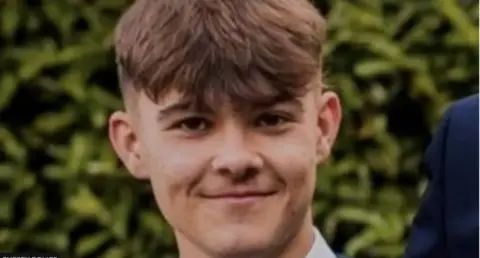 Sussex Police Close up photo of a young man with brown hair