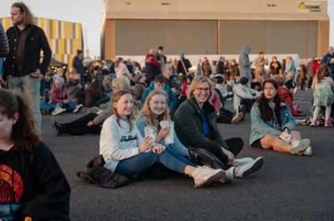 Family sitting in audience