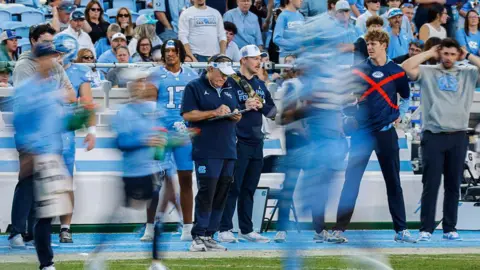 Getty Images Bill Belichick stands on the sidelines during a game against the Duke Blue Devils in November