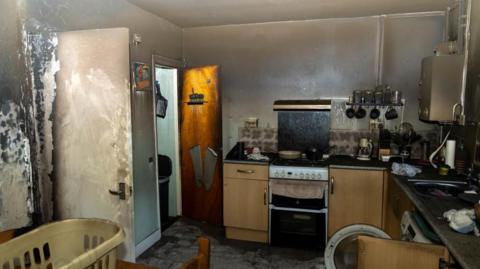 The kitchen which is significantly burnt in the fire at Jack Burley's house