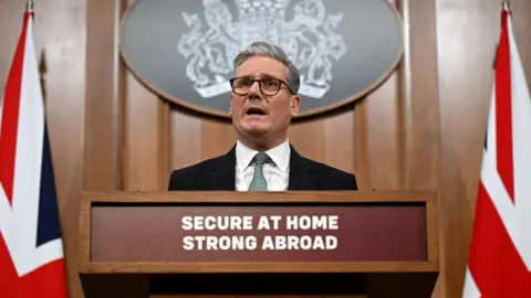 Reuters Prime Minister Keir Starmer delivers a statement on defence spending at Downing Street on February 25, 2025