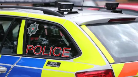 Side view of PSNI car.