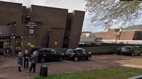 An exterior view of Medway Magistrates Court, showing the entrance and signage to the building.